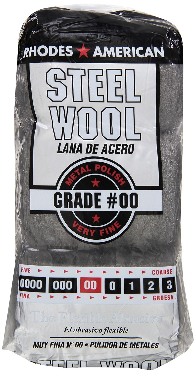 Homax steel wool pads in use on a metal surface